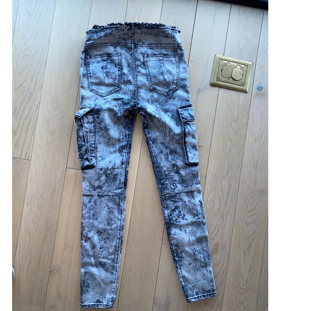 Unravel tie up acid jeans